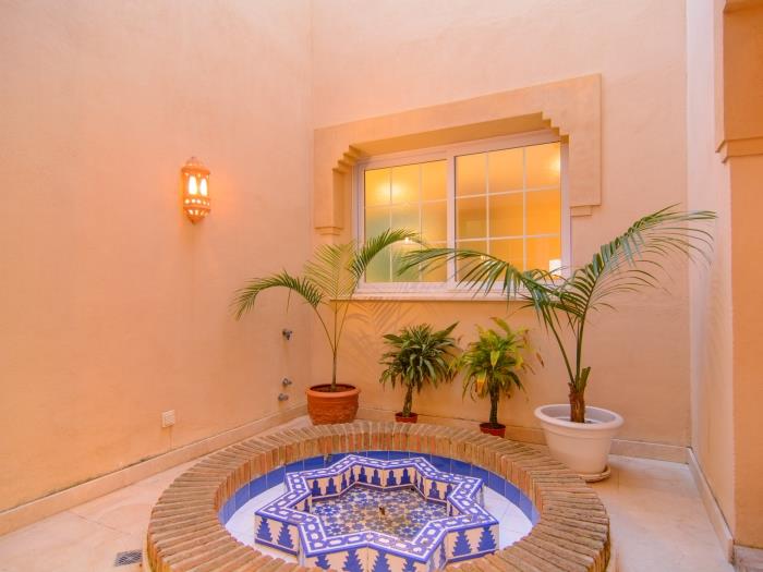 Moroccan style fountain in the center of villa