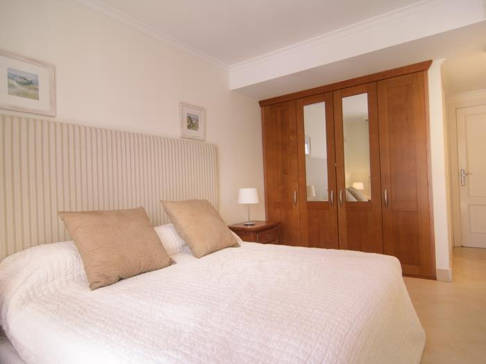 Double bed (150x190cm), large wooden wardrobe
