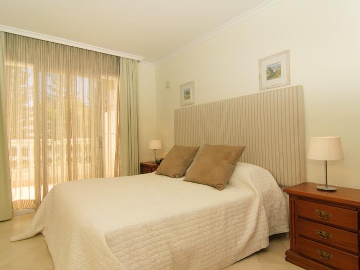 Double bed and sliding door with exit to terrace