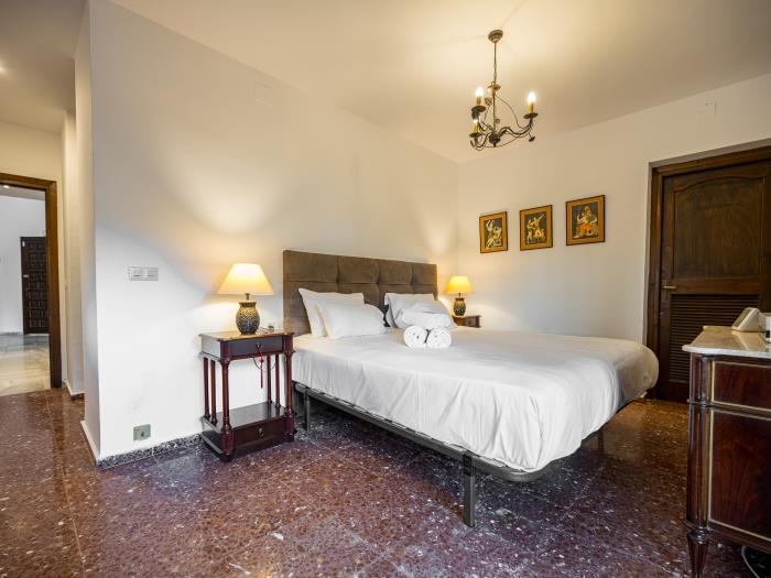 Master bedroom has a 180cm bed (2x90cm), dresser