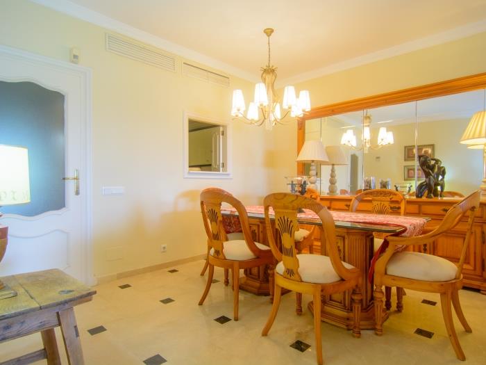Dining area with six seater wooden dining table