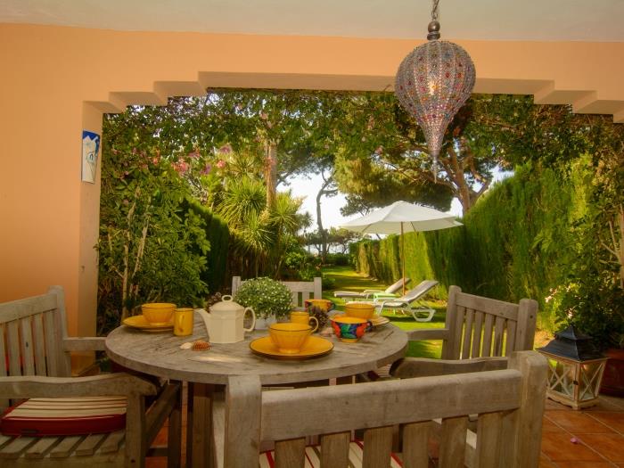 Rustic set of wooden furniture on terrace