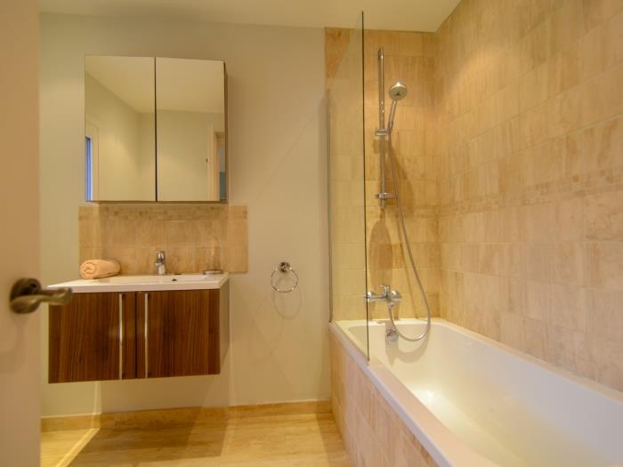 Walk in shower cabin with rain shower head