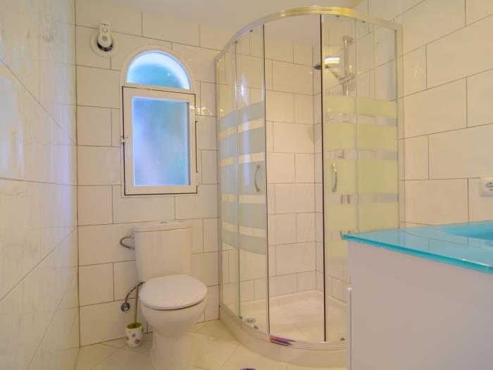 Family bathroom with walk in shower and sink