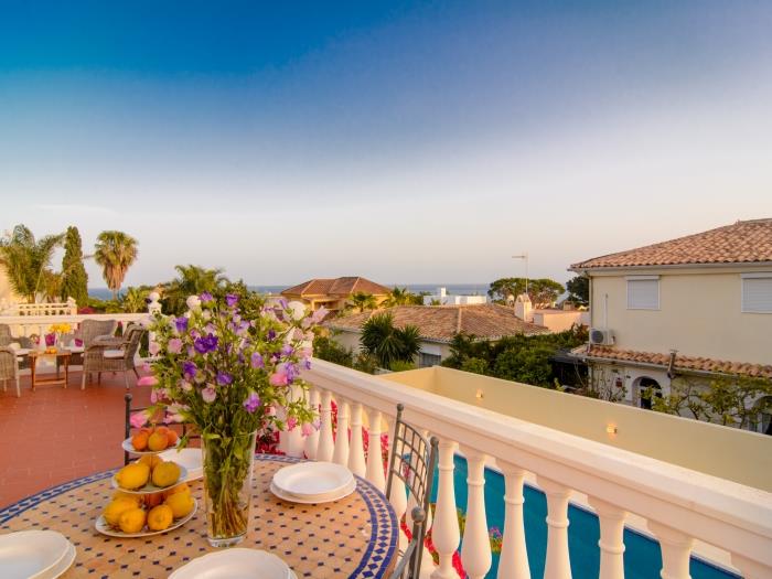 Terrace with dining table and lounge area