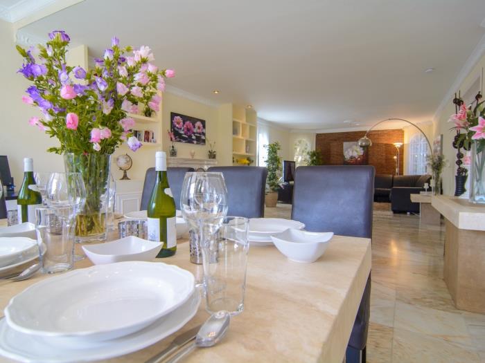Eight sitter table in dining area of the living