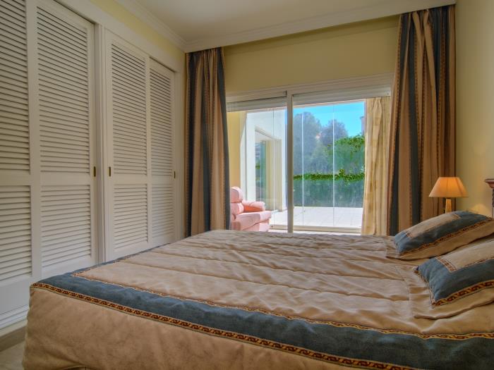 Exit to terrace from master bedroom, wardrobes