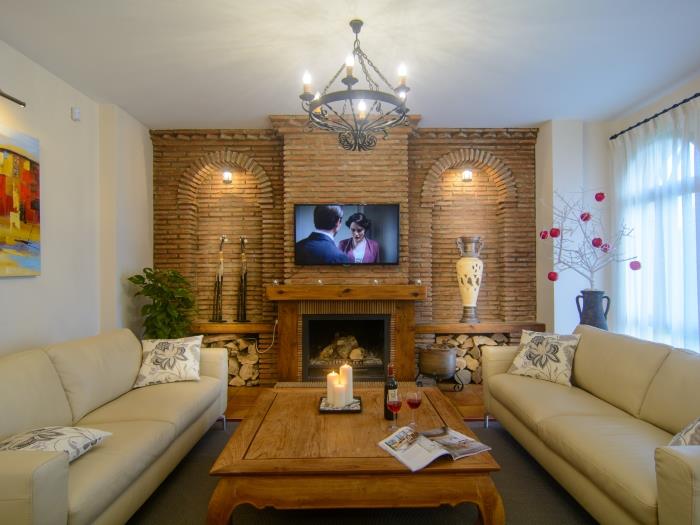 Homey atmosphere lounge area w wooden coffee table