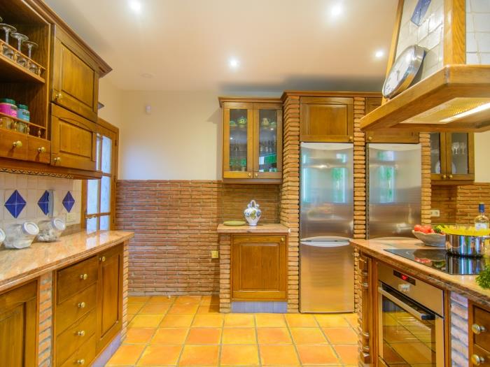 Built in modern equipment in classical kitchen