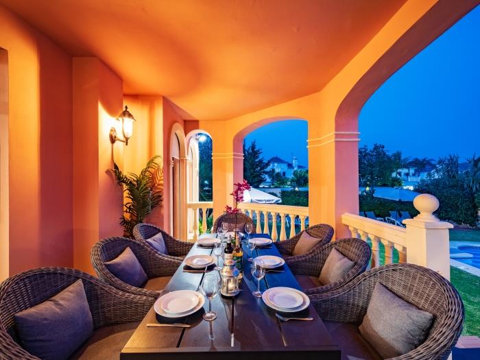 Terrace with dining area, lounge area, pool view