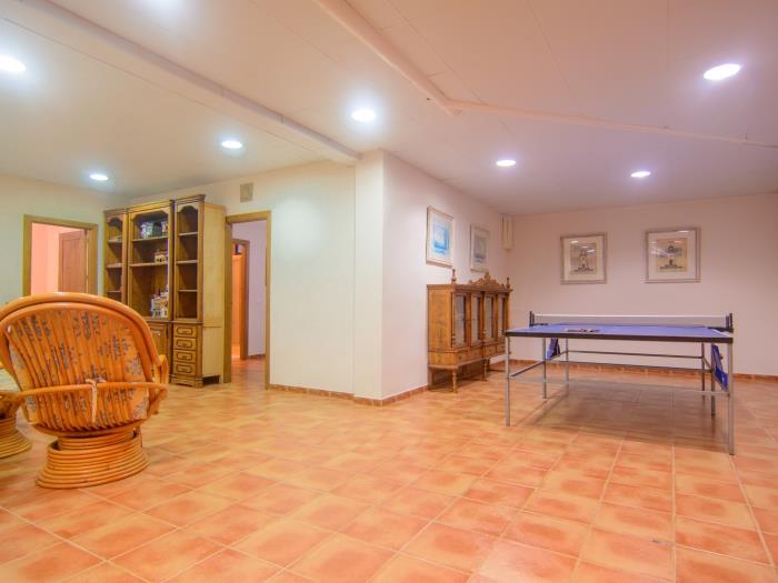 Semi basement large game room, lounge area, garage