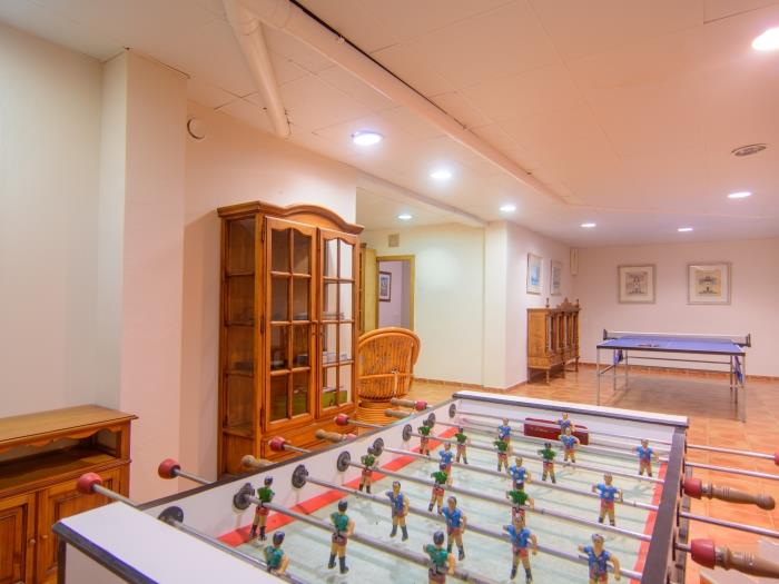 Football table, ping pong table in semi basement