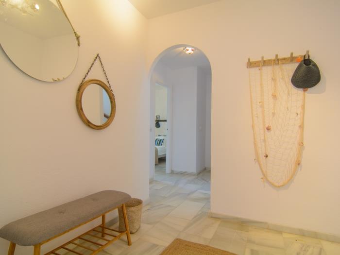 Spacious recessed wardrobes in bedroom