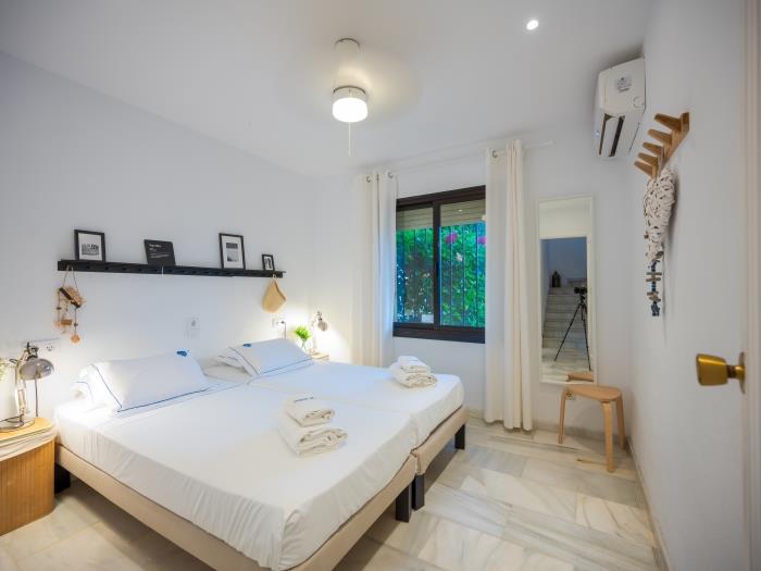 Recessed wardrobes in guest bedroom