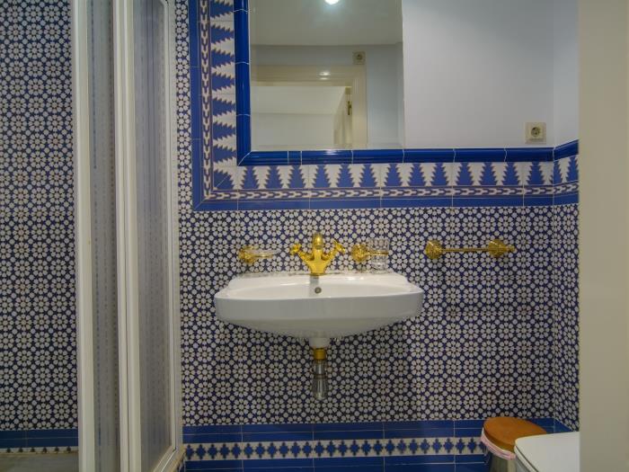 Family bathroom with walk in shower and sink