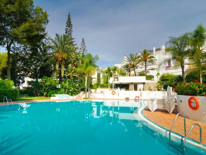 Three pools in the middle of the urbanization