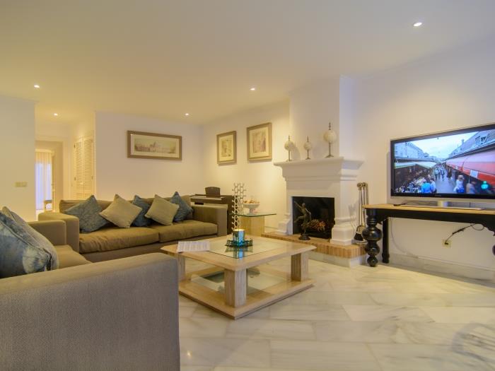 Sitting area with coffee table and spacious sofas