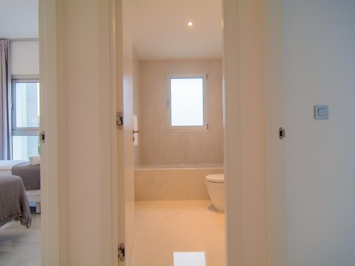 Family bathroom with tub, sink for guest bedrooms