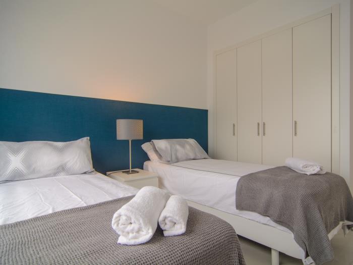 Large wardrobes and two single beds