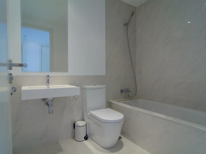 Family bathroom with tub, sink for guest bedrooms