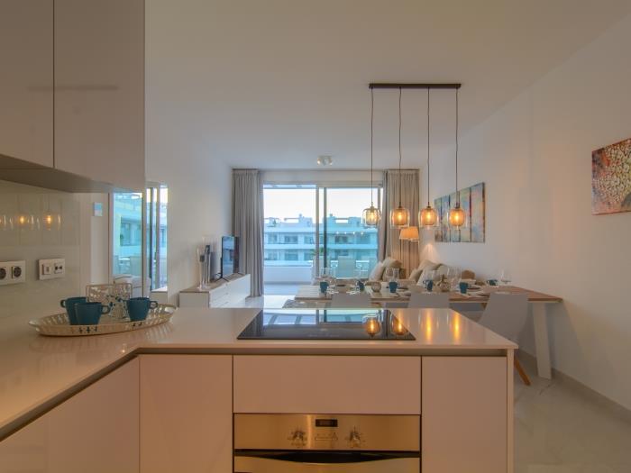 Open plan kitchen, neat design and marble tiles