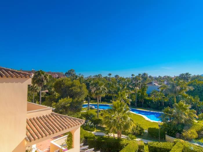 Beautiful mountain views and view over the free shaped urbanization pool