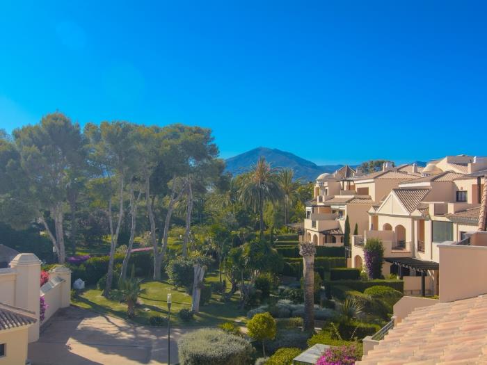 Beautiful mountain views and view over the free shaped urbanization pool