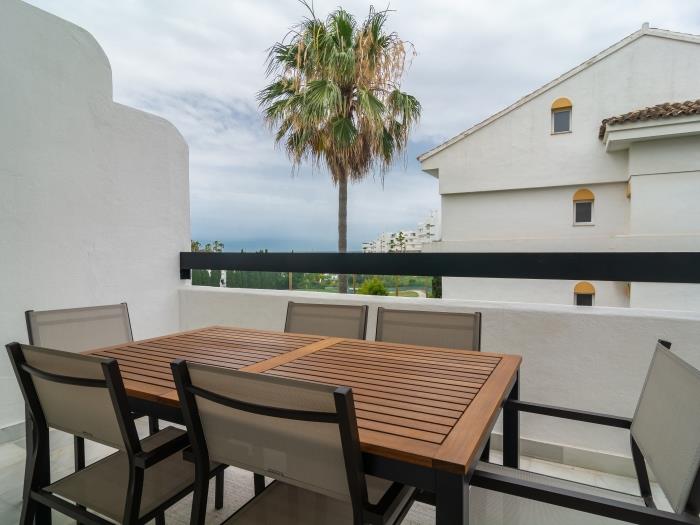 Terrace on the main level of the apartment with beautiful sea views