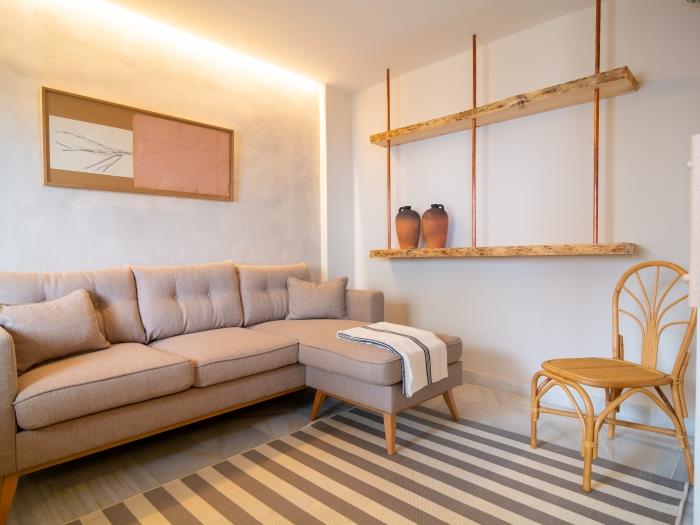 Welcoming space with work desk and comfortable sofa