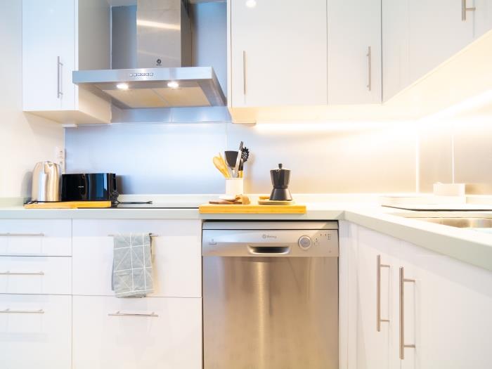All needed equipment in kitchen with Balay appliances and table for 4